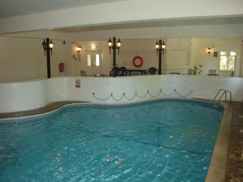 Swimmingpoolen hos eller tæt på Salty Smiles Cottage