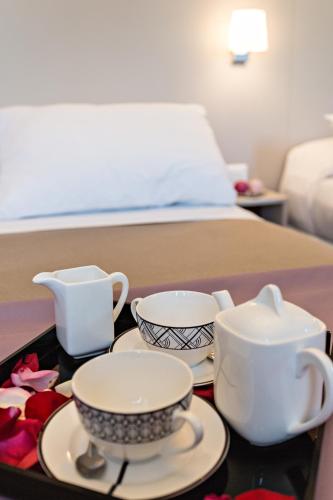 Katil atau katil-katil dalam bilik di Modern Hotel