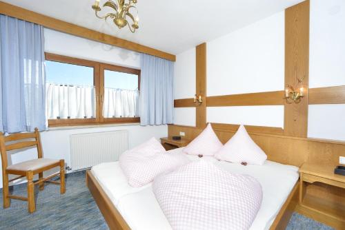 Ένα ή περισσότερα κρεβάτια σε δωμάτιο στο Ferienwohnungen Rauth