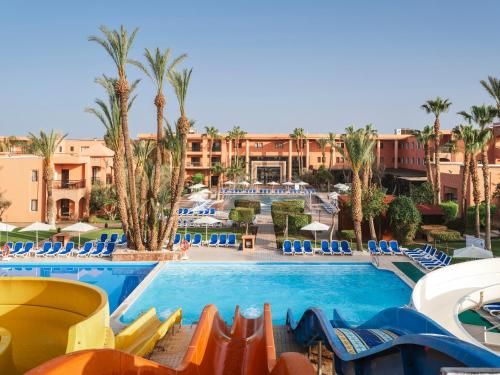 a view of the pool at the resort at Aqualis Club Resort Marrakech in Marrakesh