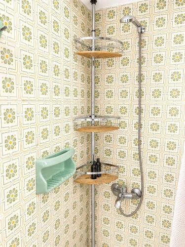 a bathroom with a shower and a sink at Horn Agios Nikolaos in Agios Nikolaos