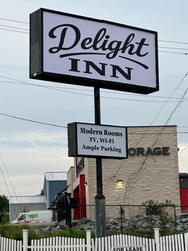 a sign for a light inn in front of a building at Delight Inn Little Rock Benton I-30 in Benton