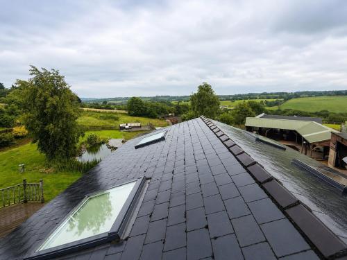 an image of a slate roof on a house at Paddock View Loft Countryside Retreat in Thornhill