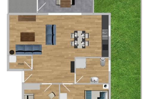a floor plan of a house with furniture at Wangerkajüte in Wangerland