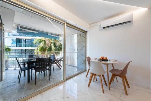 1-Bd Apartment with Terrace - Mere Steps from the Beach