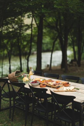 a picnic table with food on top of it at Kami The Essence in Danilovgrad