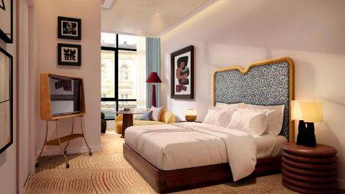 a bedroom with a bed with a large headboard at Petra Hotel Belgrade in Belgrade