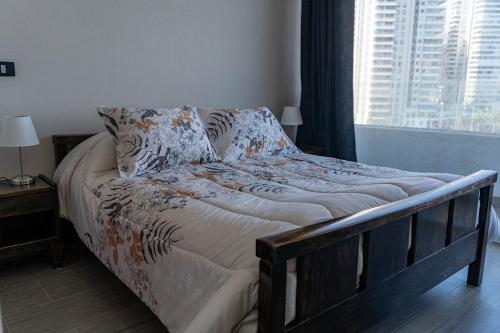 Llit o llits en una habitació de Distrito