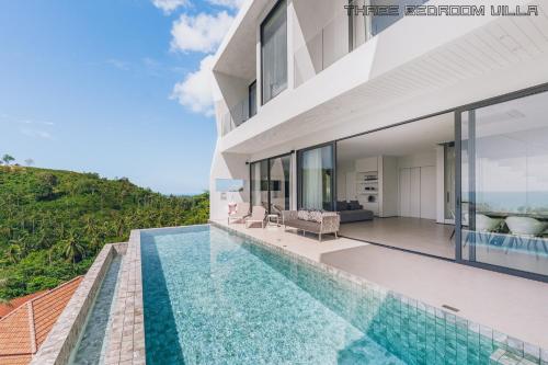 an image of a house with a swimming pool at AAA villa in Ban Bang Po
