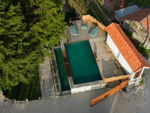 an overhead view of a swimming pool on a house at Villas Santo António in Baião