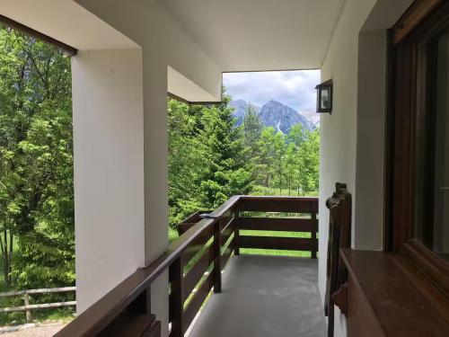 a balcony with a view of a mountain at Chalet Capriol by My Villa Collection in Cortina dʼAmpezzo