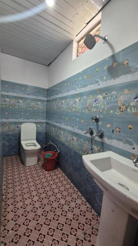 Baðherbergi á Hotel astha