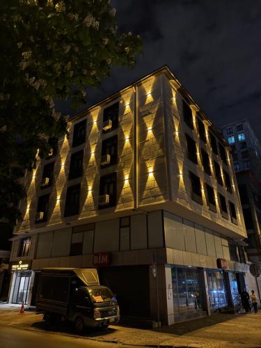 a building with a truck parked in front of it at Twelve Diamond Hotel12 in Istanbul