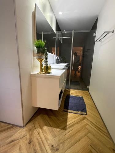 a bathroom with a sink and a mirror at rooms 48 in Eilat