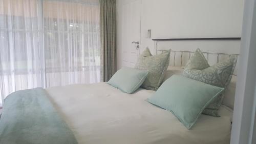 Cama o camas de una habitación en Spring Acres Guesthouse
