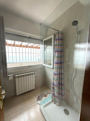 a bathroom with a shower and a sink at Villa Blue Paradise in Vinarós
