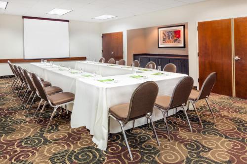 a large conference room with a long table and chairs at Wyndham Garden Monterrey Norte in Monterrey