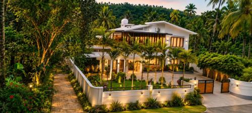 an aerial view of a house with a garden at Mon Reve Holidays in Kozhikode