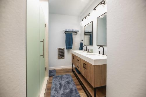 a bathroom with a sink and a mirror at Pacifica Strand Unit 15 in Oceanside