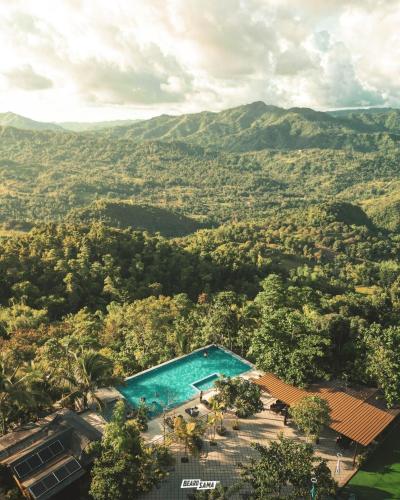 an aerial view of a swimming pool in the mountains at Mabini Sky View in Cebu City