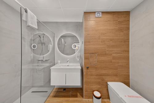 a bathroom with a white sink and a shower at Boutique Hotel Opal ULTRA ALL INCLUSIVE in Sunny Beach