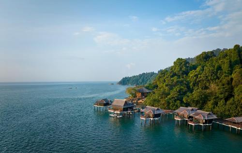an aerial view of a resort in the water at Pangkor Laut Resort - Small Luxury Hotels of the World in Pangkor