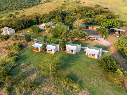 an aerial view of a house on a hill at Sunset Safari Camp at Hluhluwe Game Park in KwaNompondo