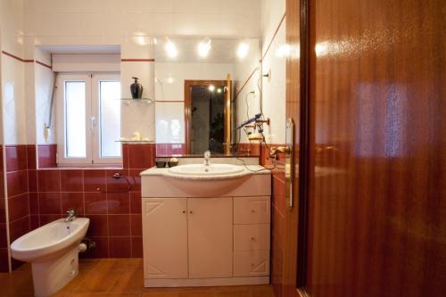 a bathroom with a sink and a toilet at Aberasturi in Gautegiz Arteaga