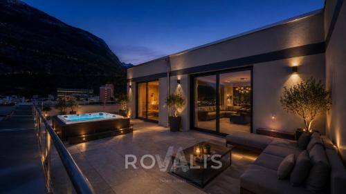 a balcony with a hot tub on a building at Brig Panorama Spa in Brig