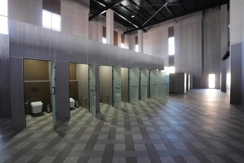 a room with a row of toilets in a building at Arda Turan in Khiva