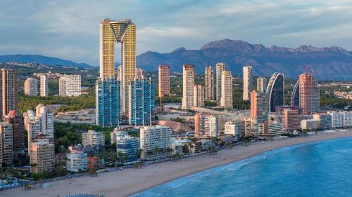 a view of a city with a beach and buildings at Intempo by Holuxe - 096 - 9th floor in Benidorm