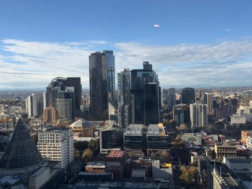 an aerial view of a city with tall buildings at Premium 3BR CBD Apt Prime Location in Melbourne