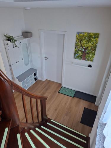 an empty room with a staircase and a window at Ferienhaus Zerbst in Zerbst
