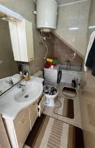a small bathroom with a sink and a toilet at Villa BESA - BA Debar in Debar