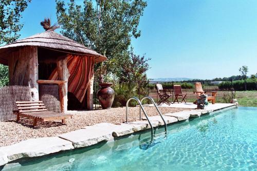 The swimming pool at or close to Le Mas de la Chouette