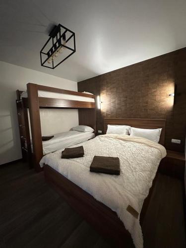 Postel nebo postele na pokoji v ubytování Gazdovsky Cottage