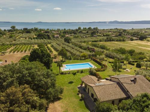 an aerial view of a estate with a swimming pool and a vineyard at Holiday Home Rosalba Bacara by Interhome in Bolsena