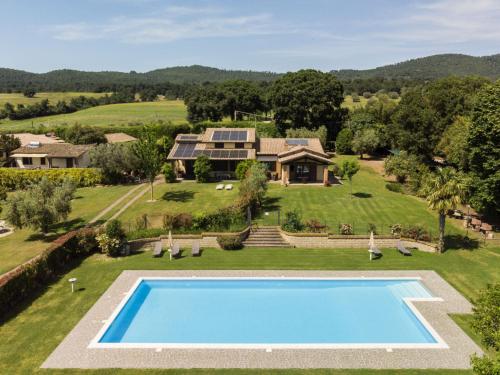 an aerial view of a house with a swimming pool at Holiday Home Rosalba Bacara by Interhome in Bolsena