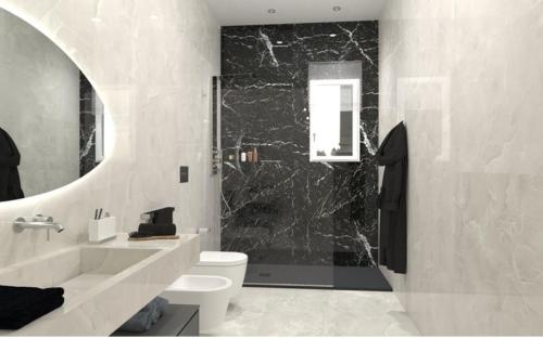 a bathroom with a toilet and a sink and a shower at Relax Rooms in Trapani