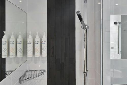 a bathroom with a shower with a glass door at Four Points Flex by Sheraton Dundee in Dundee