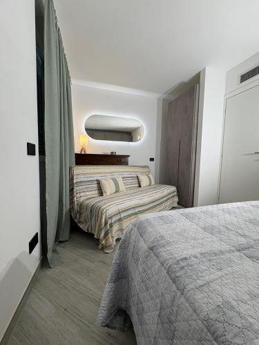 a bedroom with two beds in a room at A due passi da Domodossola in Crevoladossola