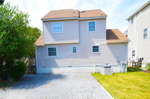 a house with a driveway in front of it at Ocean Pines-Harborview Drive 17 home in Ocean Pines