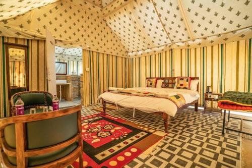 a bedroom with two beds in a room at Best desert camp in jaisalmer The Velvet Dunes in Sām