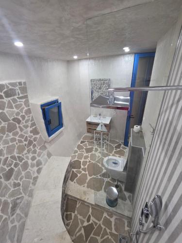 a bathroom with a sink and a toilet at Divlja dolina in Budva