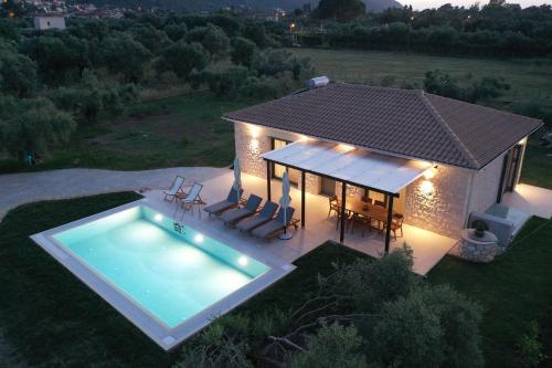 an overhead view of a house with a swimming pool at Anagallis Villas in Lefkada