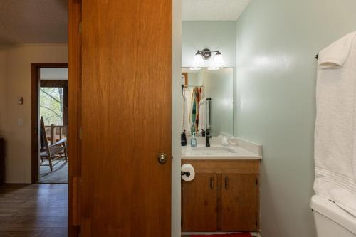 a bathroom with a sink and a mirror at Eagle Point - Powder Horn Mountain in Powderhorn Mountain