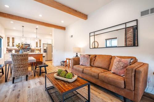 a living room with a couch and a table at Downtown Truckee Walkable 6 Bed Pet Friendly in Truckee