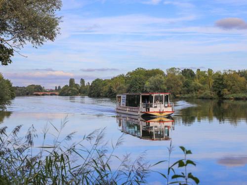 a boat on the water on a river at ibis Metz Nord in Woippy