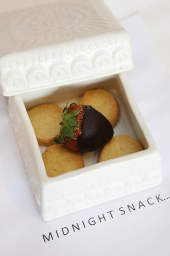 a white box filled with different types of cookies at Origin Ubud in Ubud