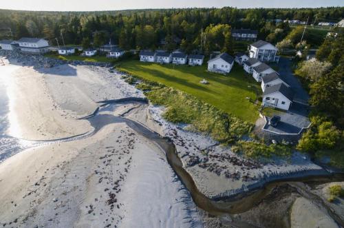 an aerial view of a beach with houses at Hunts Point Beachside Suite #13 in Summerville Centre